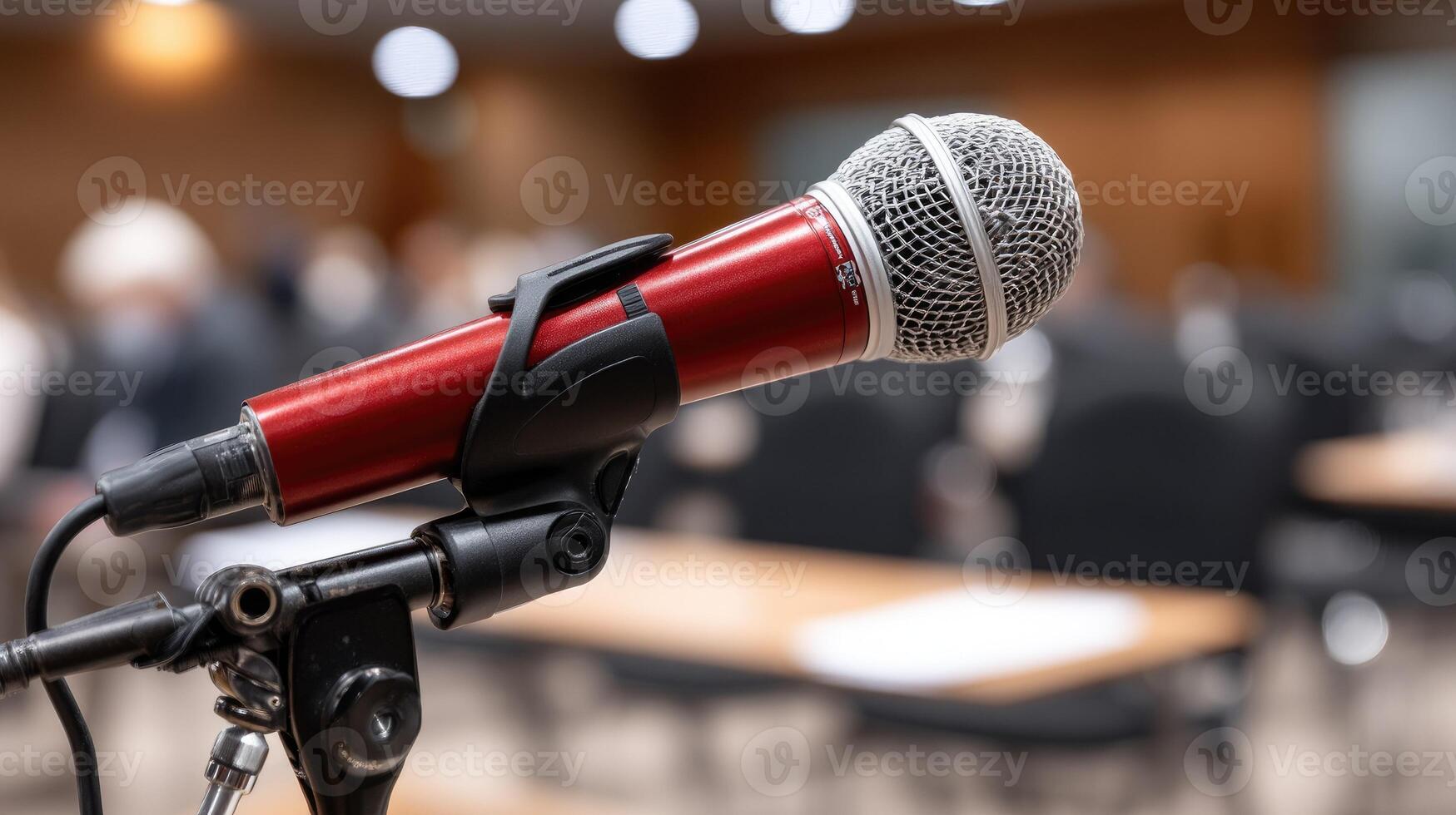 Microphone in conference room with blurred background photo