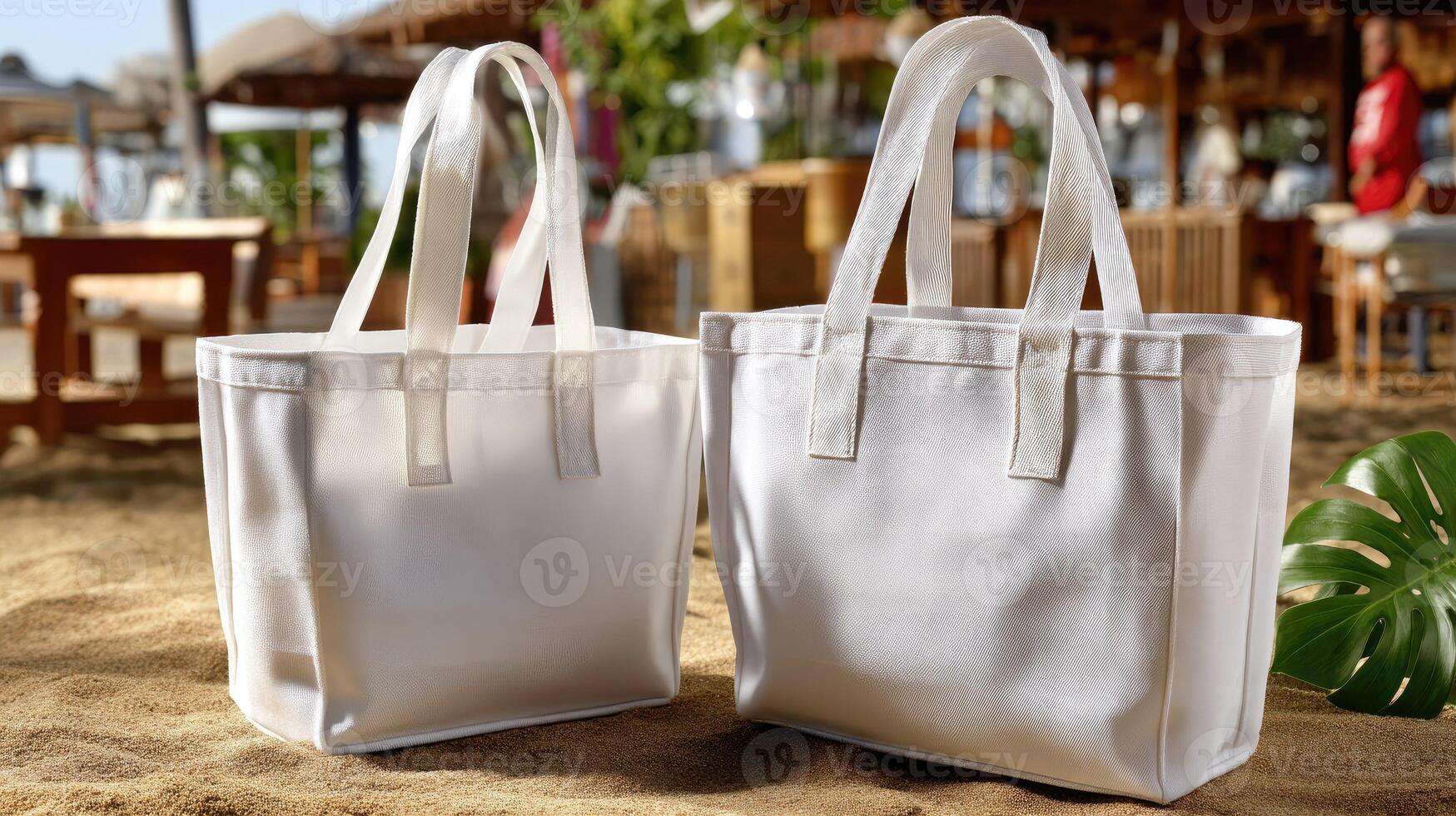 Two white bags sitting on the beach near the ocean photo