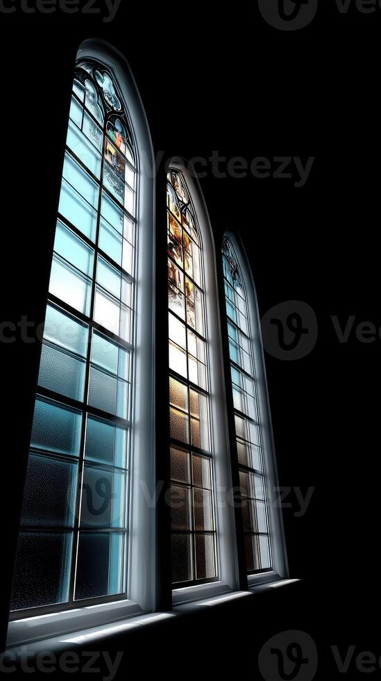 A dark room with three windows and a cross photo