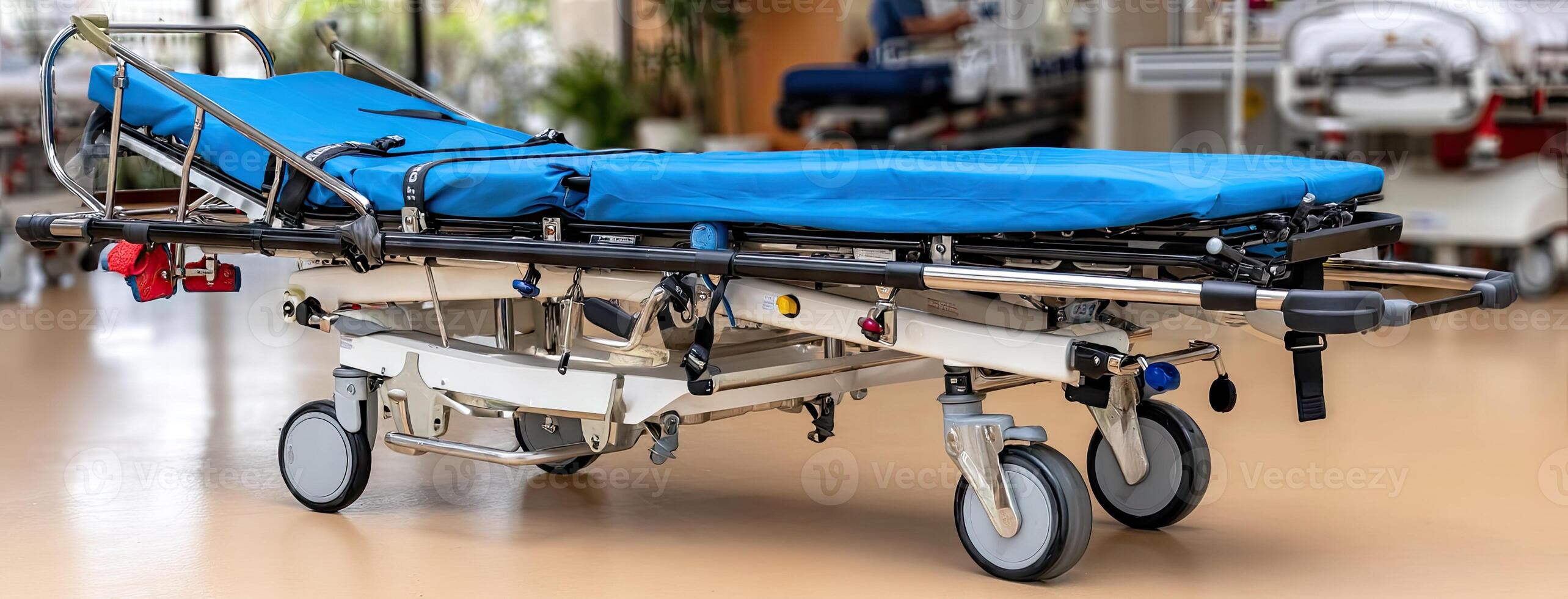 A hospital emergency medical cart with blue cover photo