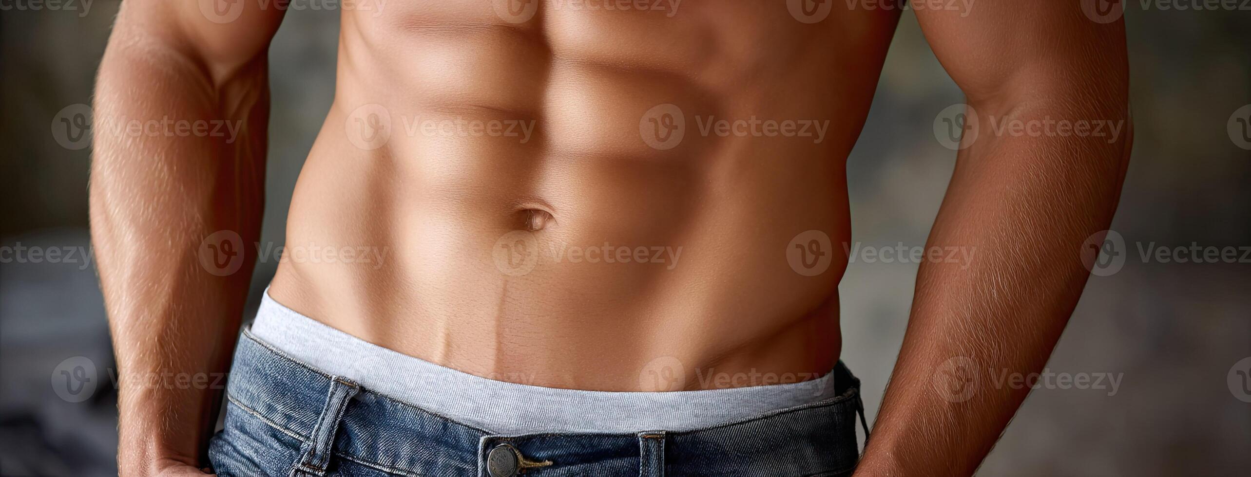 A man's torso with his abs showing photo