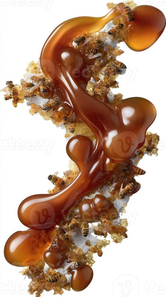A piece of caramel is being poured into a glass photo