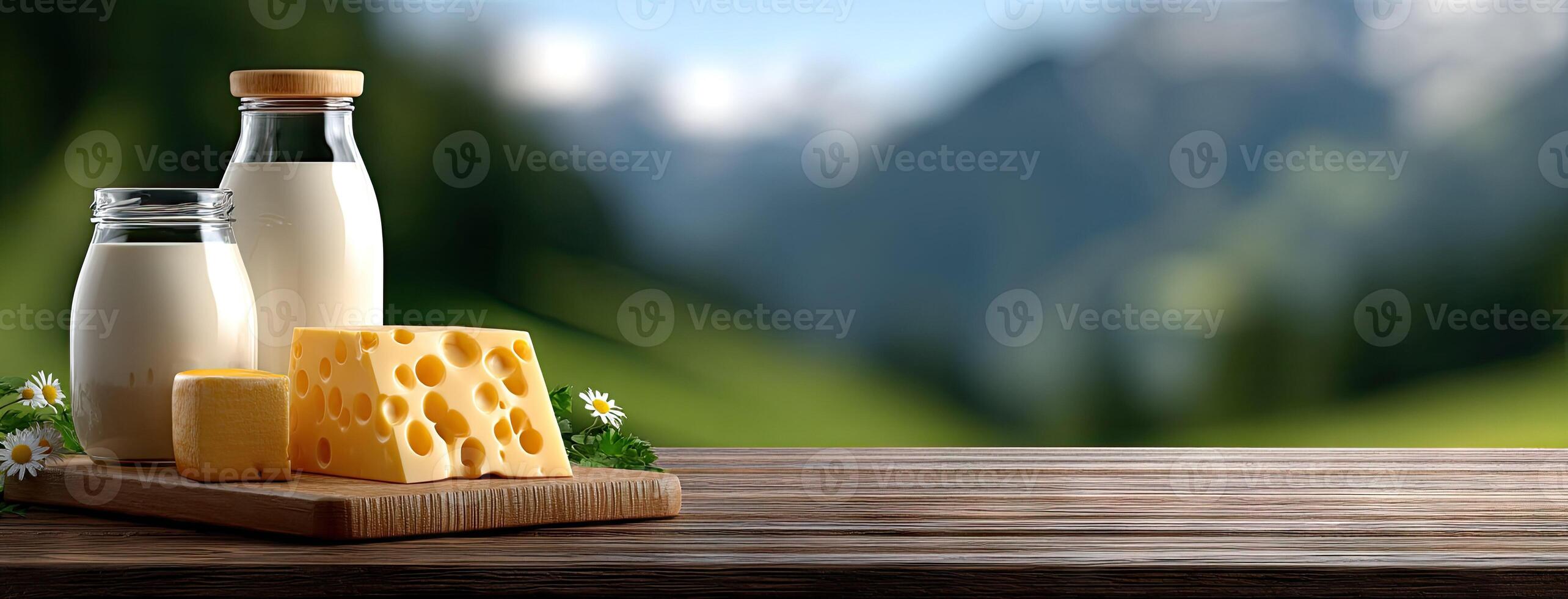 A bottle of milk and cheese on a table photo
