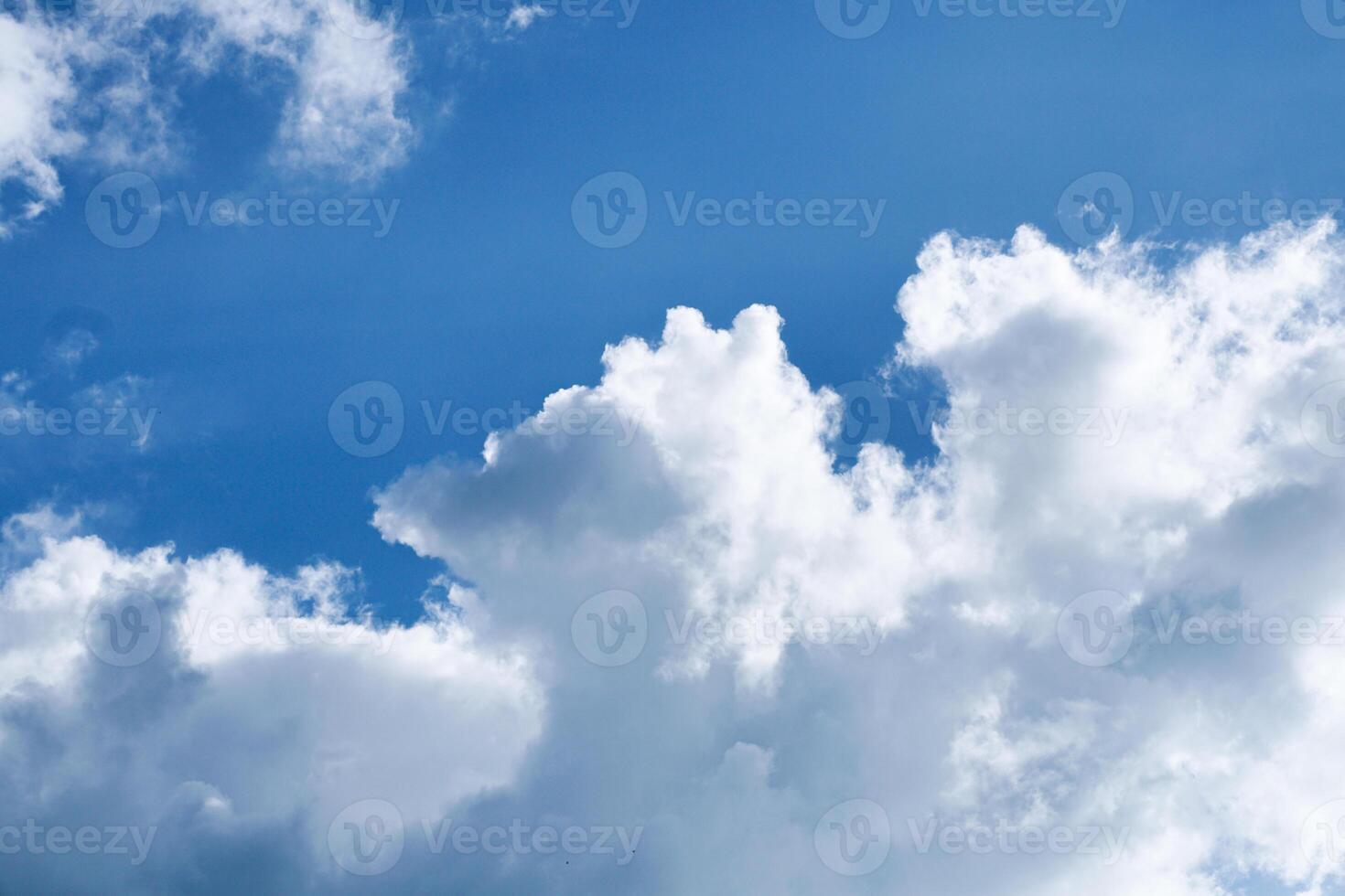 Aerial white clouds on blue sky. Blue sky backgrond nature. beautiful aerial cloudscape view from above, bright cloudy sky view from buttom with copy space, sunny heaven landscape photo