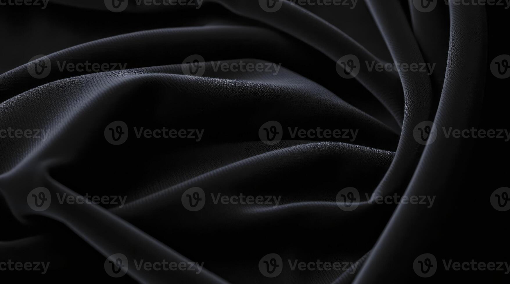 Black silk fabric with folds and folds photo