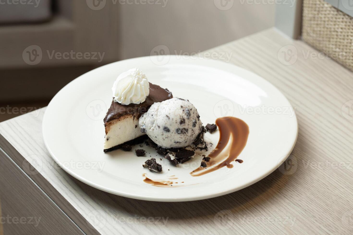 Chocolate cake with luscious cookie ice cream. photo