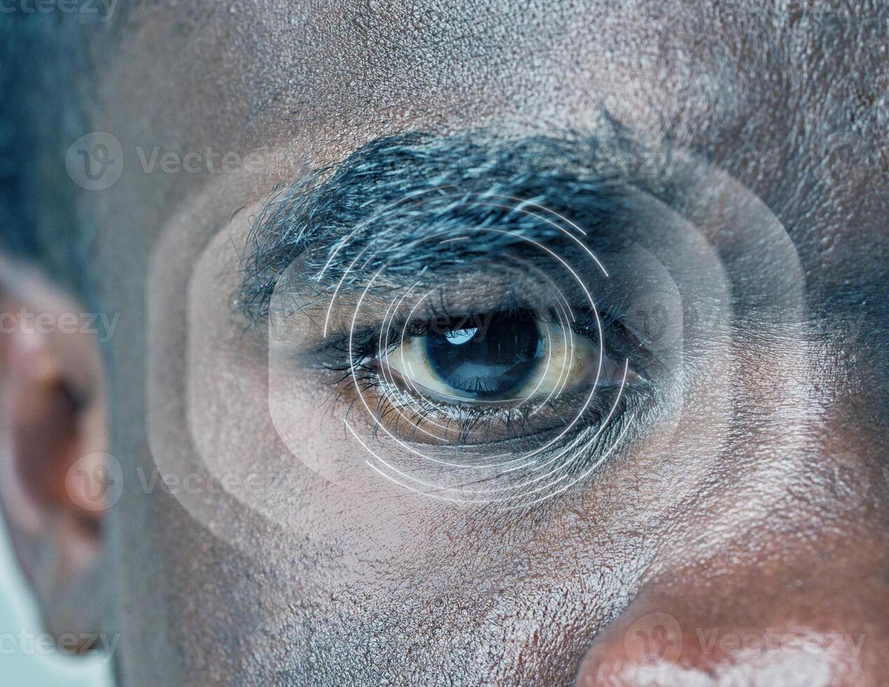 Close-up of a human eye with graphical overlay highlighting pupil and iris details during an optical analysis session photo