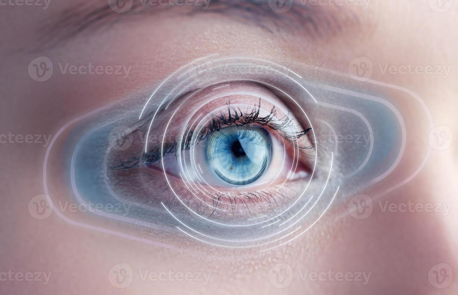 Digital eye interface technology showing futuristic enhancements in a close-up of a human eye with blue iris pattern photo