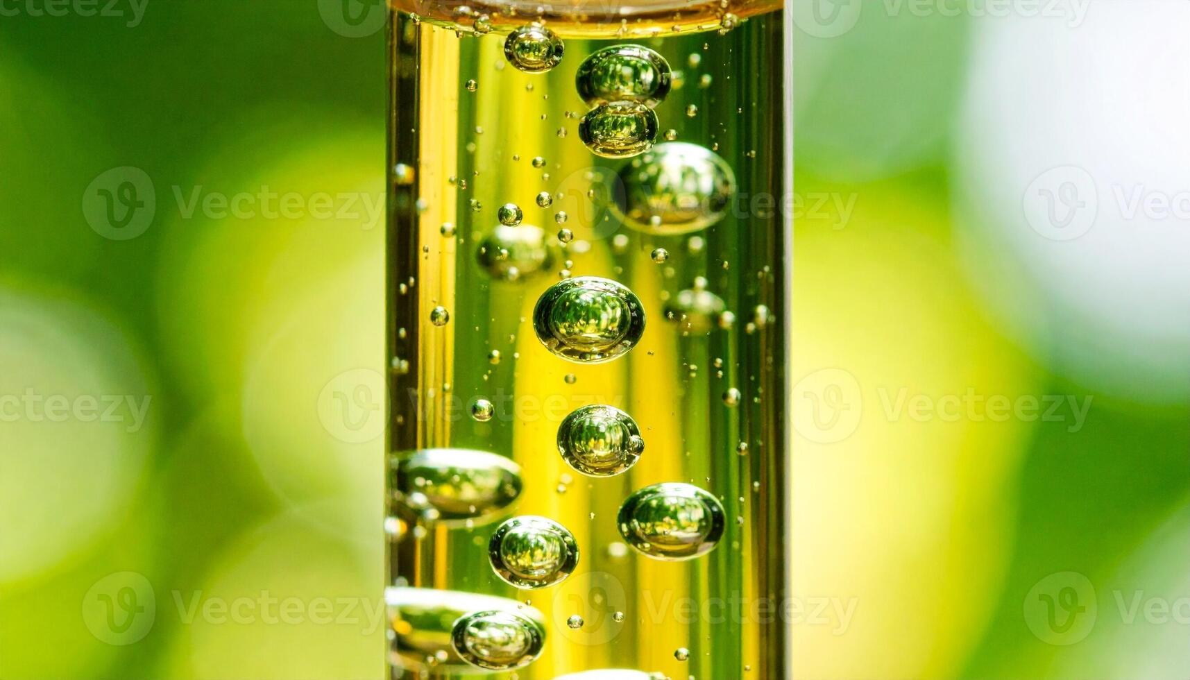 Bubbles Rising in a Clear Liquid Under Bright Natural Light Creates a Mesmerizing Effect photo