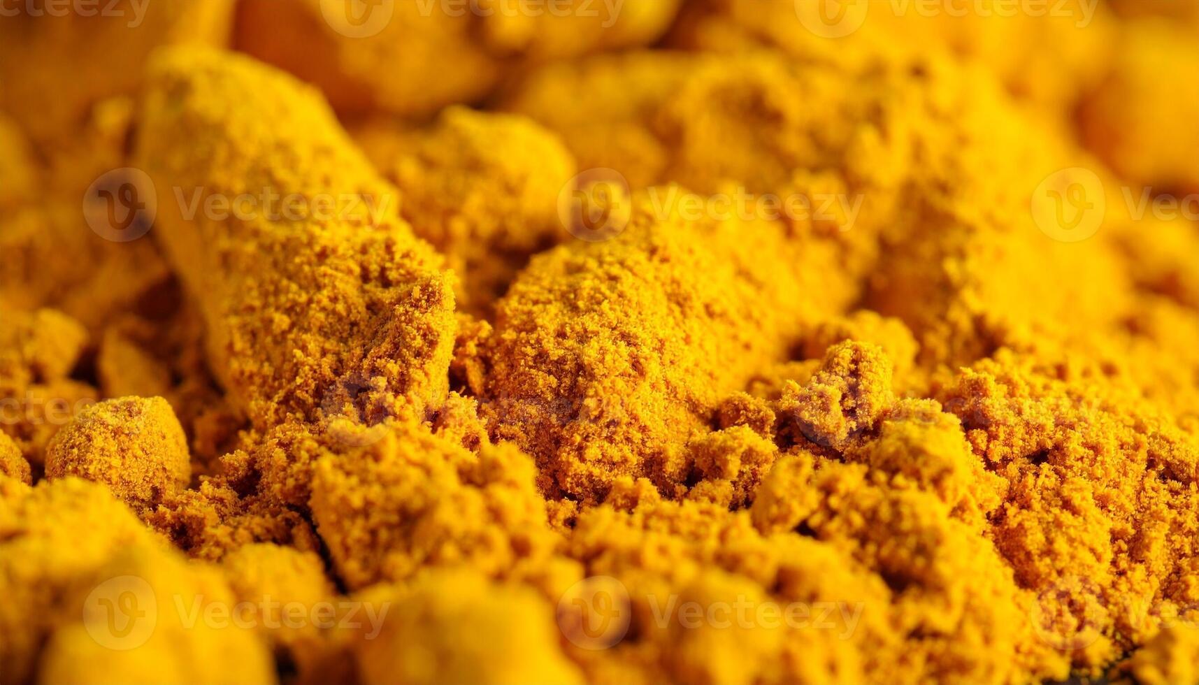 Bright Yellow Turmeric Powder Used in Cooking and Natural Remedies Displayed in a Close-Up View photo