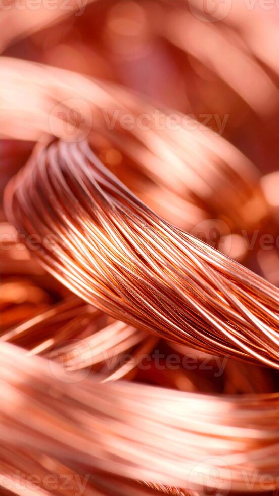 Copper Wires Coiled Together Showcasing Their Shiny Texture and Metallic Luster in Natural Light photo