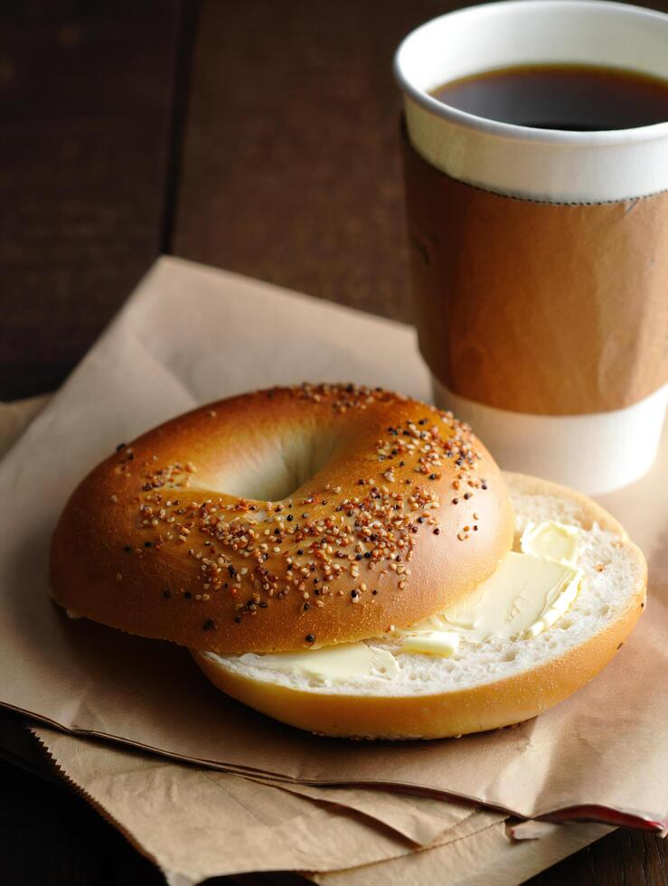 Coffee Background Delicious Everything Bagel with Butter and Coffee Breakfast Food Photography photo