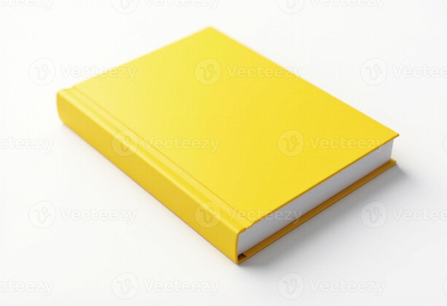 Angled View of Yellow Notebook in Soft Shadow photo