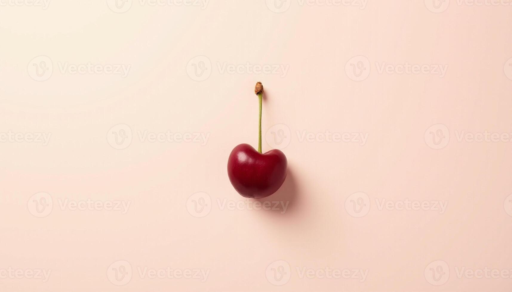 Twin cherries placed on soft blush background in minimal style. photo