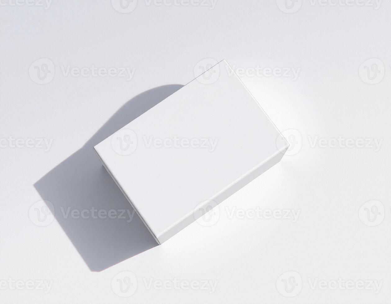 An empty white box sitting on a table photo