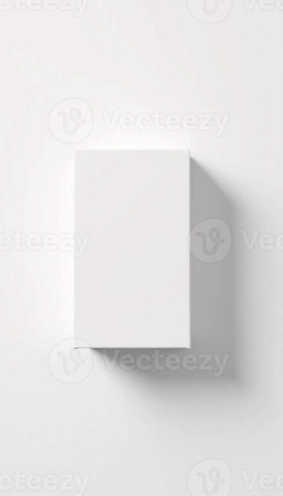 White box on a plain surface with a shadow photo