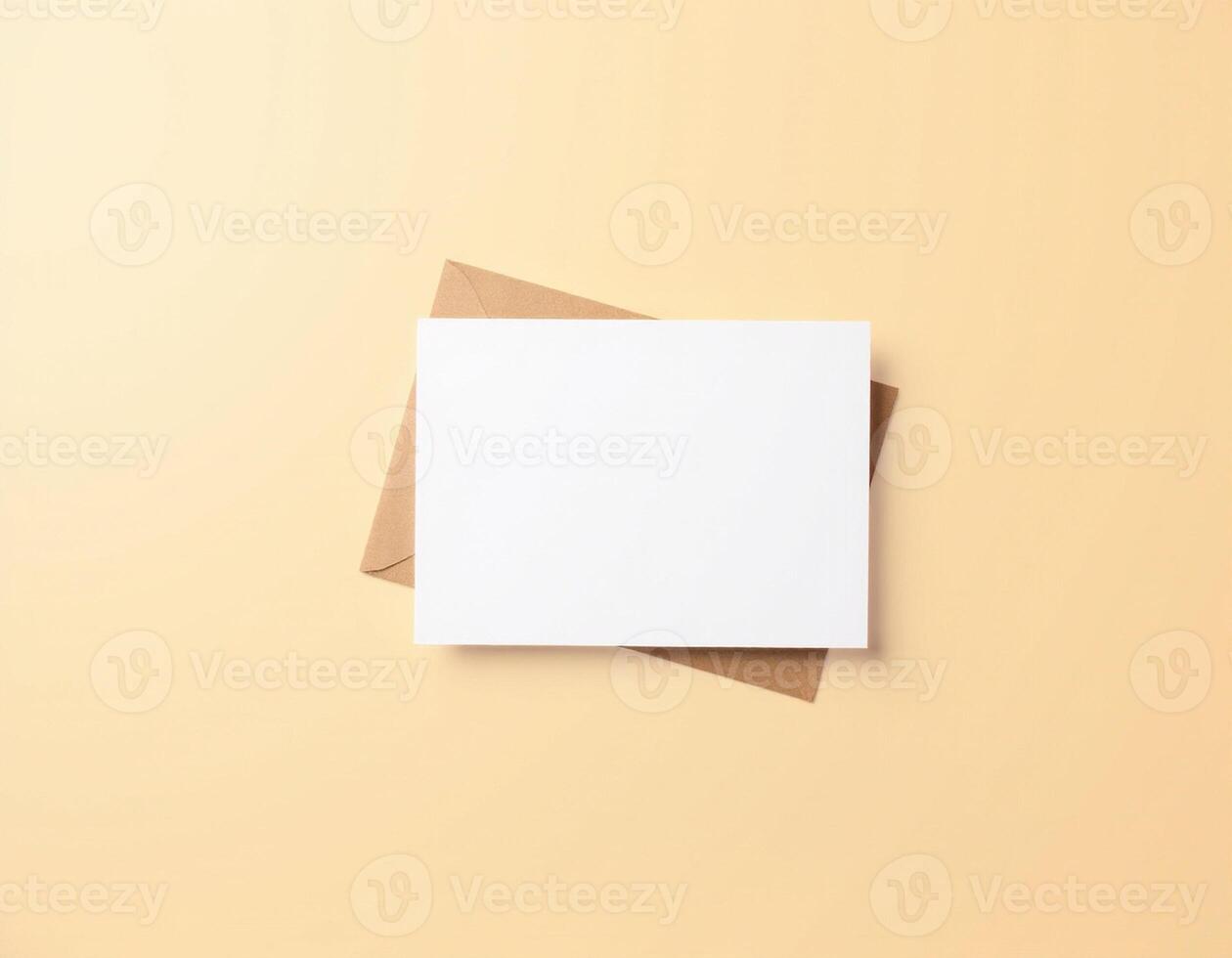 Blank white card on yellow background photo