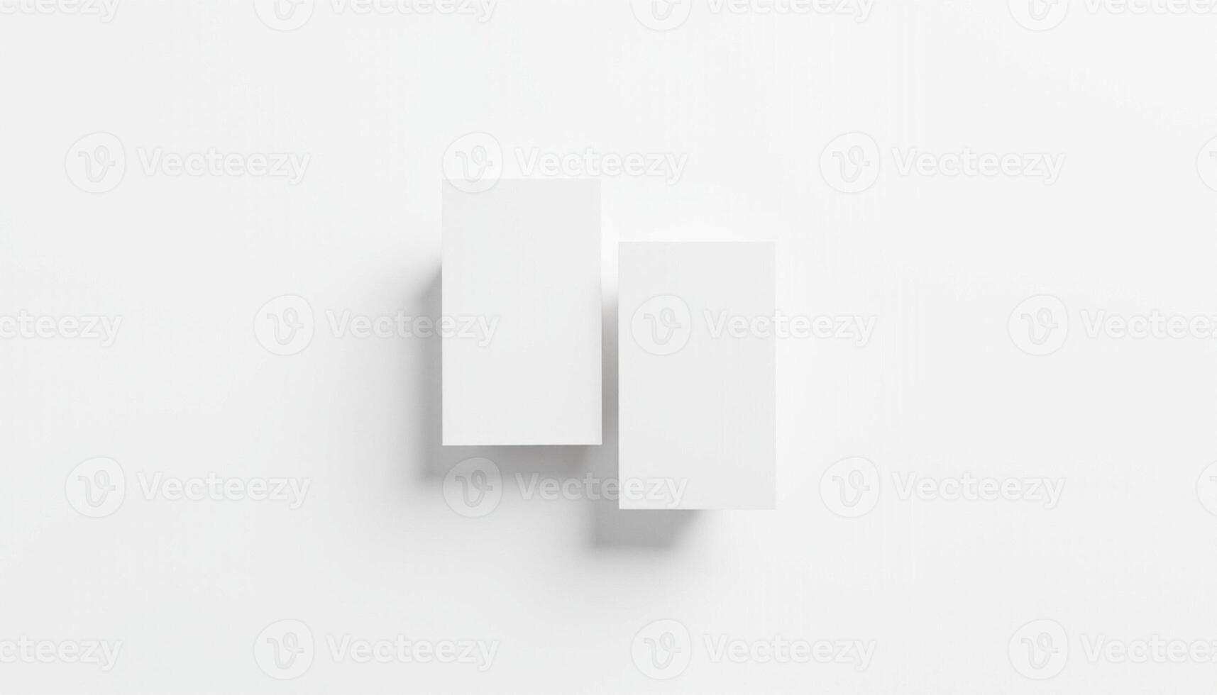 Two white boxes on a white surface photo