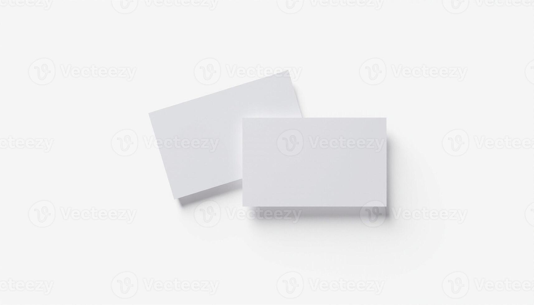 Two blank white paper notes on a white background photo