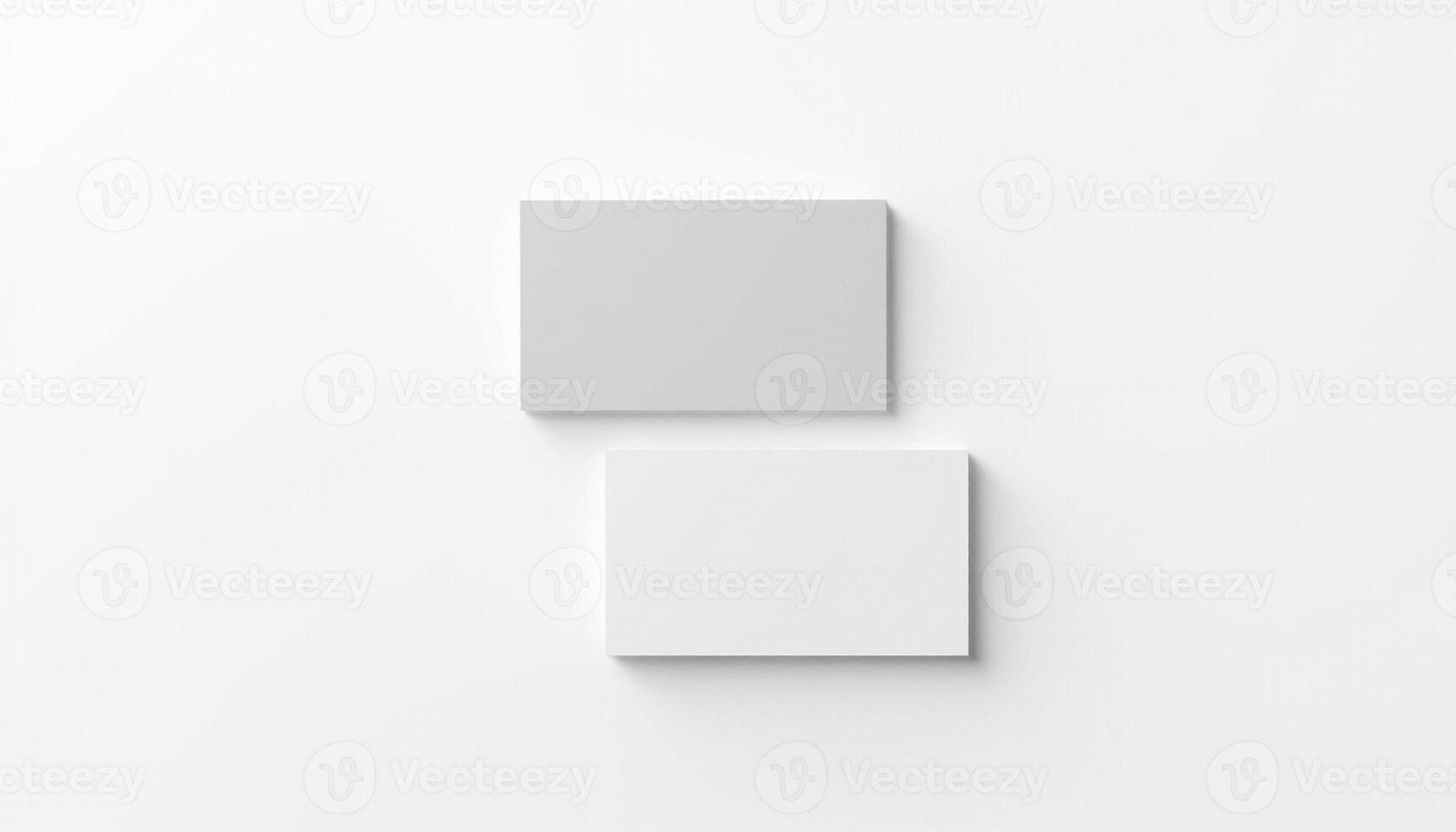 Two square white boxes on a white surface photo