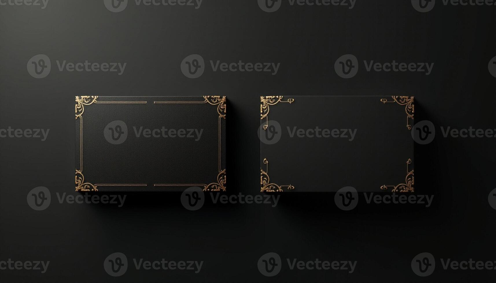 Two black square boxes with gold ornate design on the black background photo
