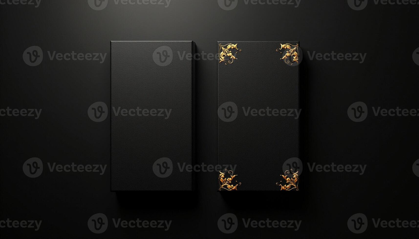 Two black boxes with gold floral design on the front photo