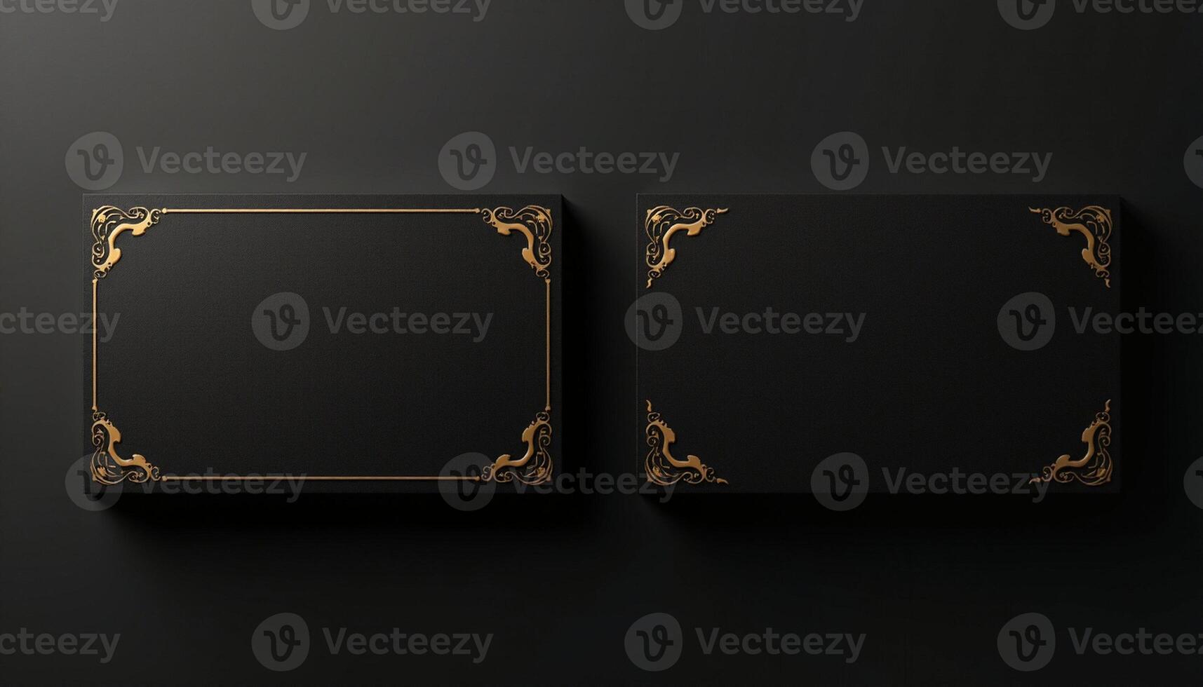 Two black square boxes with gold trim on a black background photo