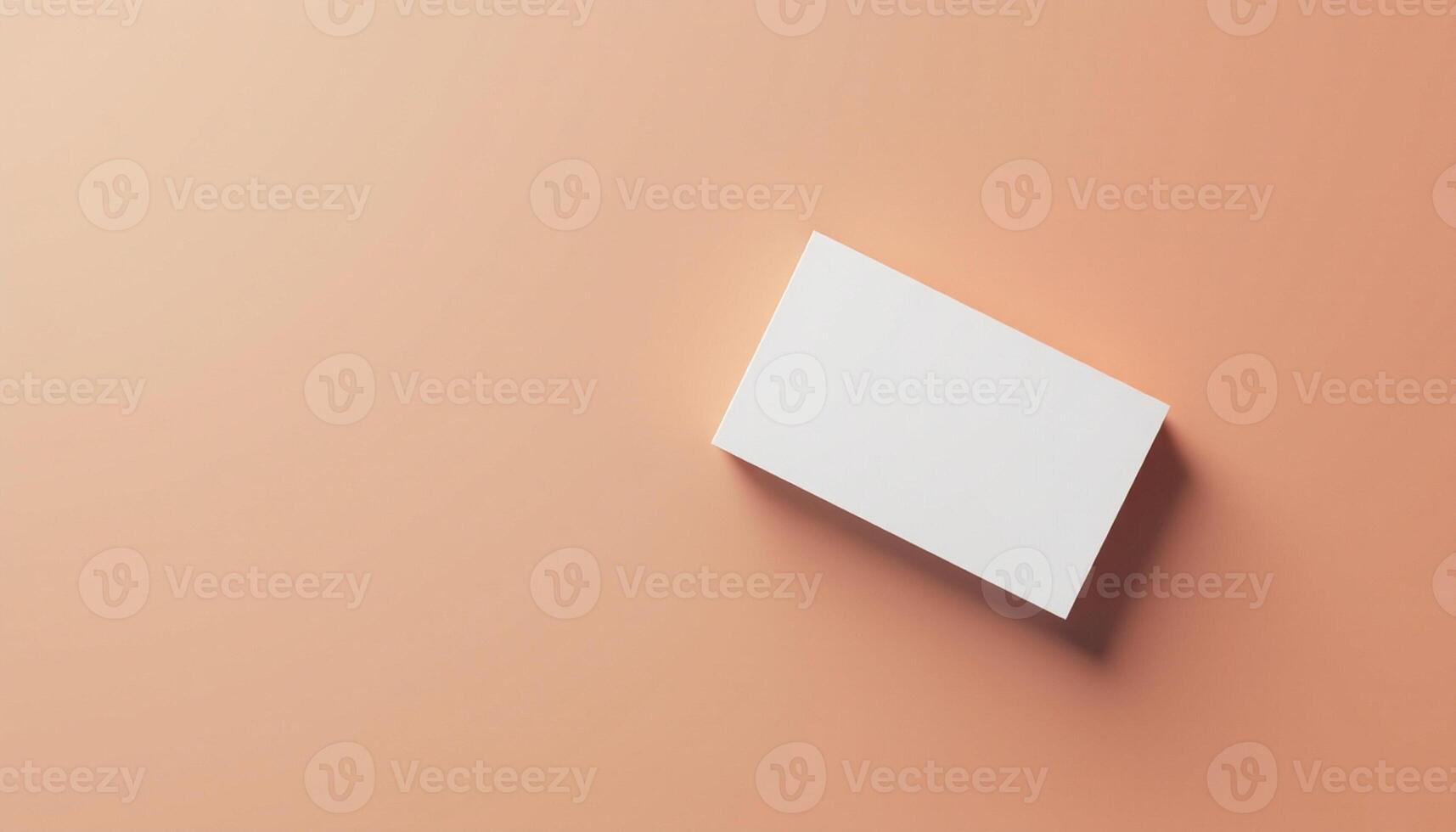A white square on a peach background photo