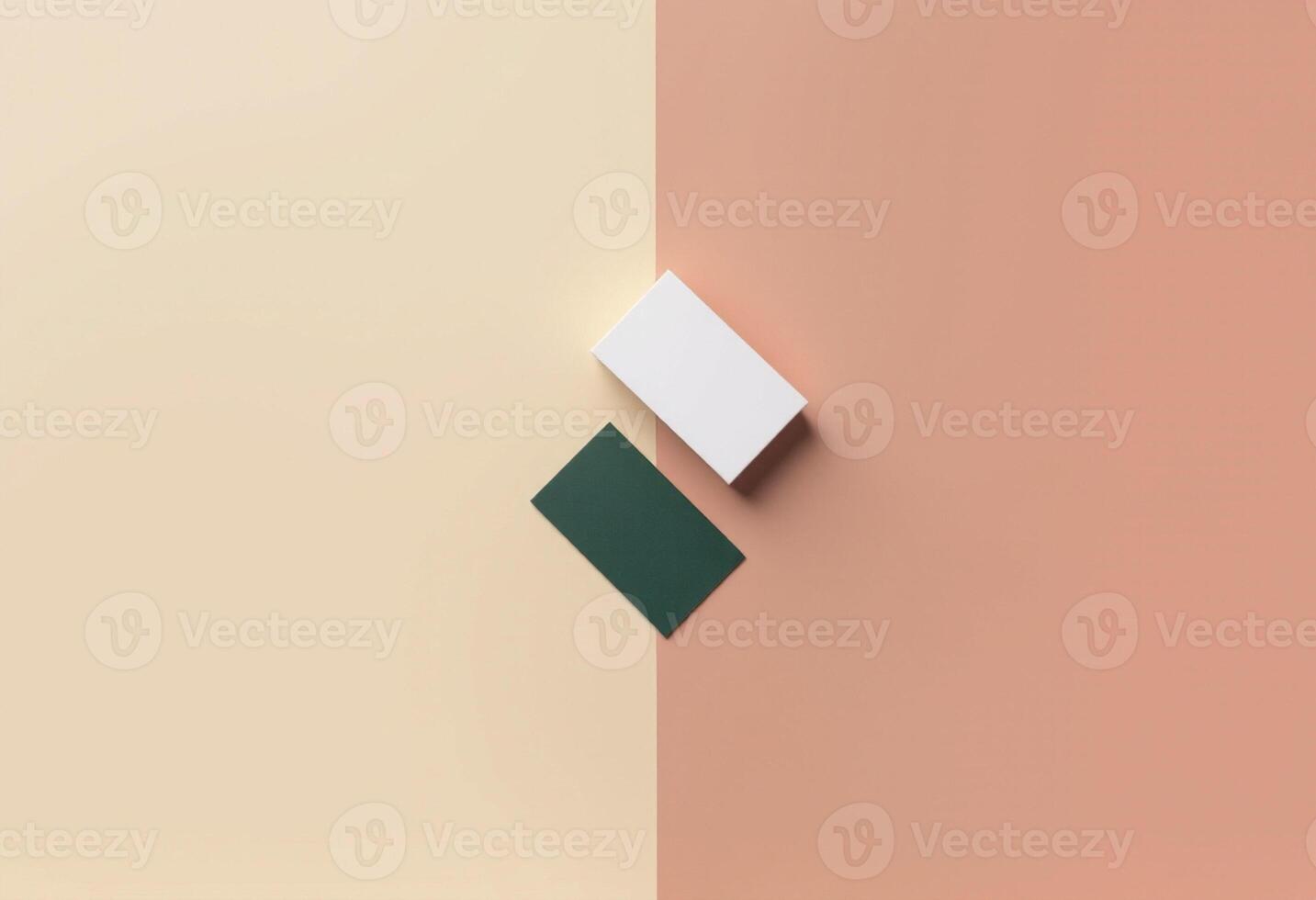 A white square and green square on a pink and green background photo