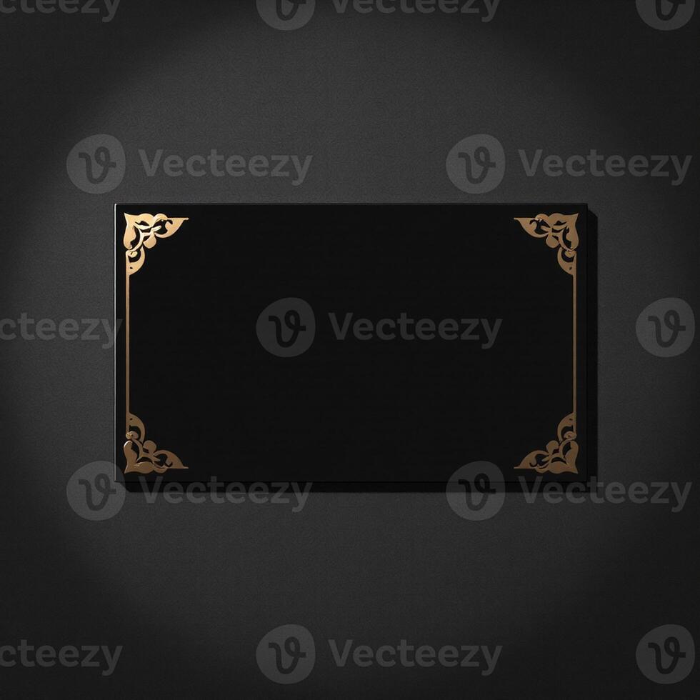 Black and gold frame on a black background photo