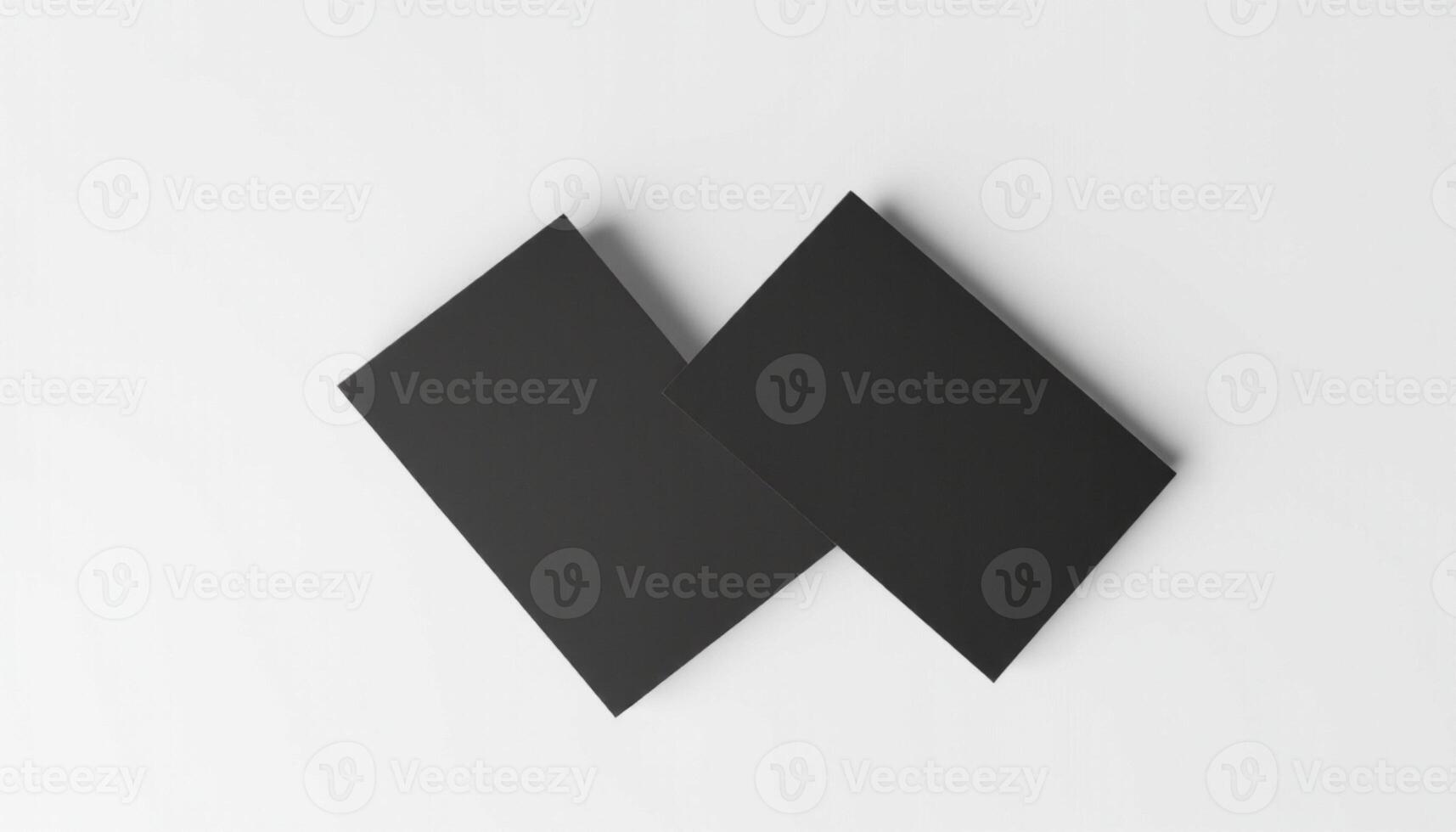 Two black squares on a white surface photo