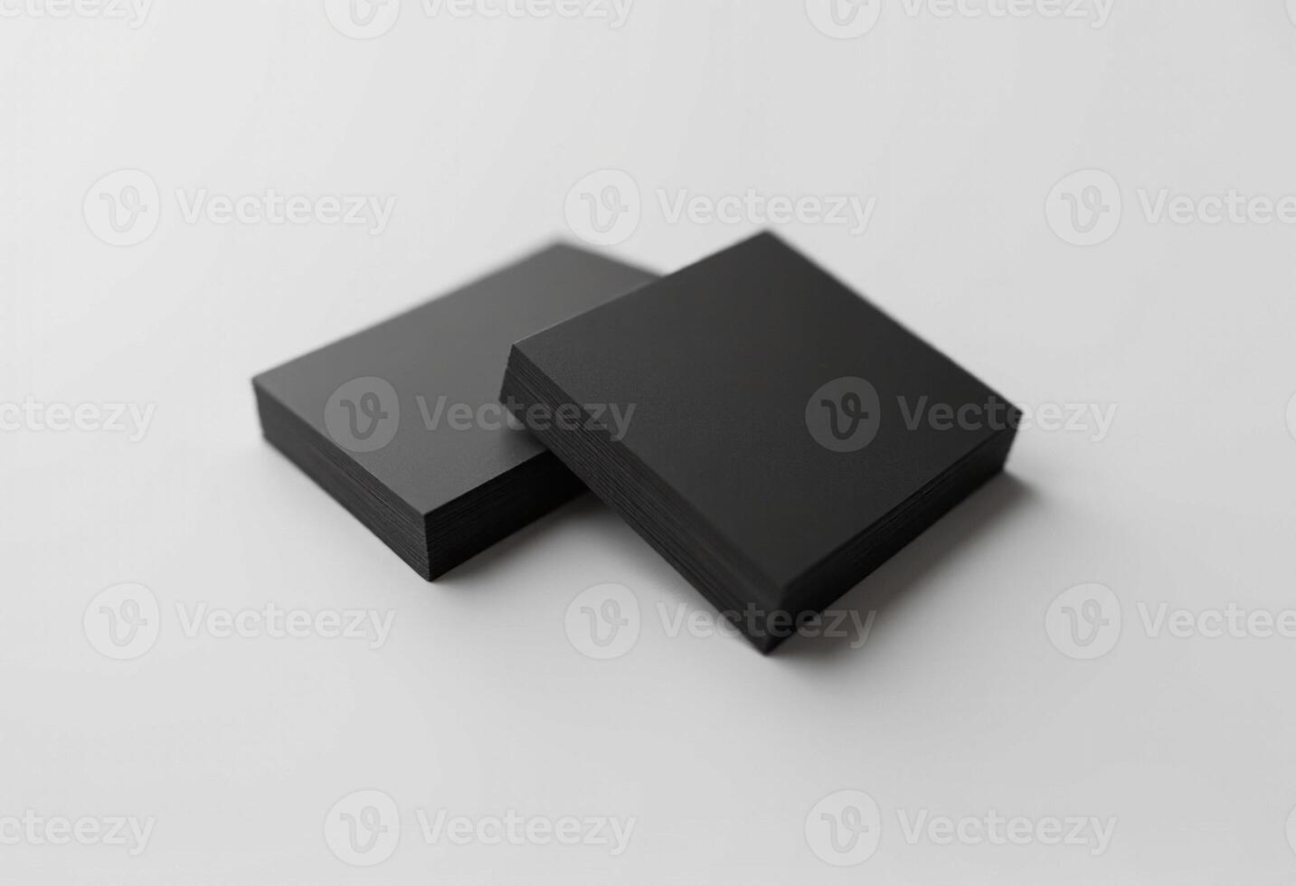 Two black boxes sitting on top of each other photo