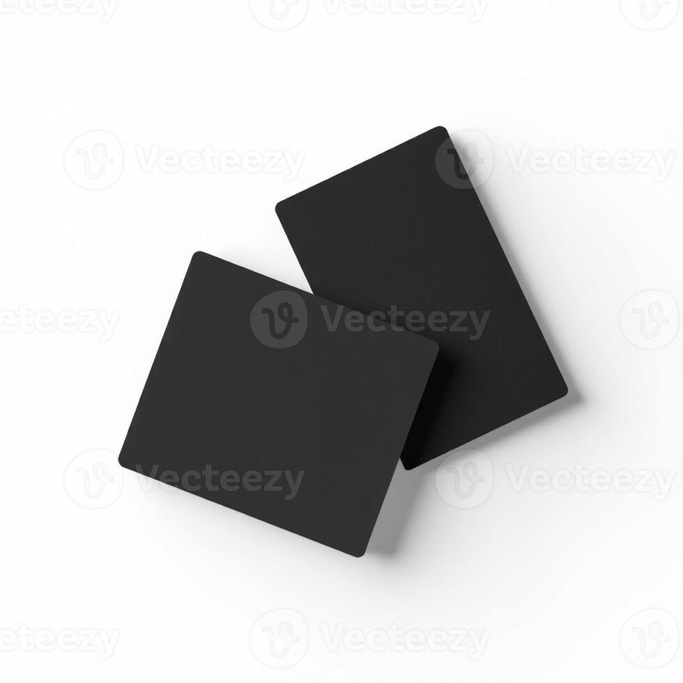 Two black cards on a white surface photo