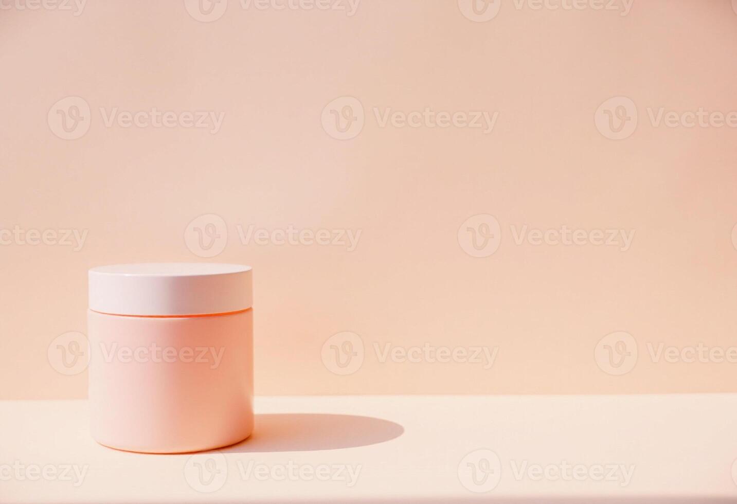 A pink container sitting on a table photo