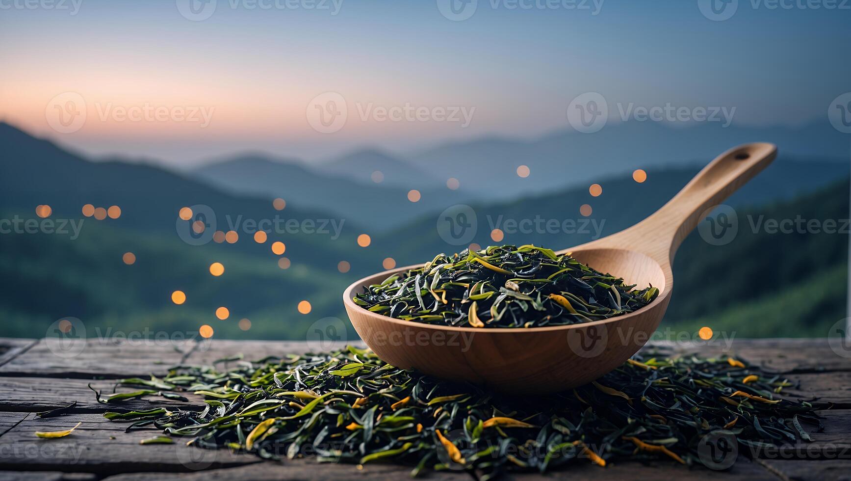 Loose Leaf Tea in Wooden Spoon on Rustic Table with Sunset photo