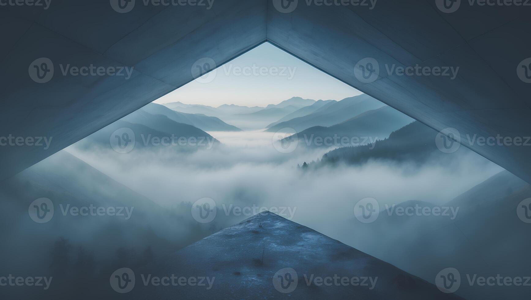 Viewing Mountain Range Through Geometric Window Frame with Fog photo