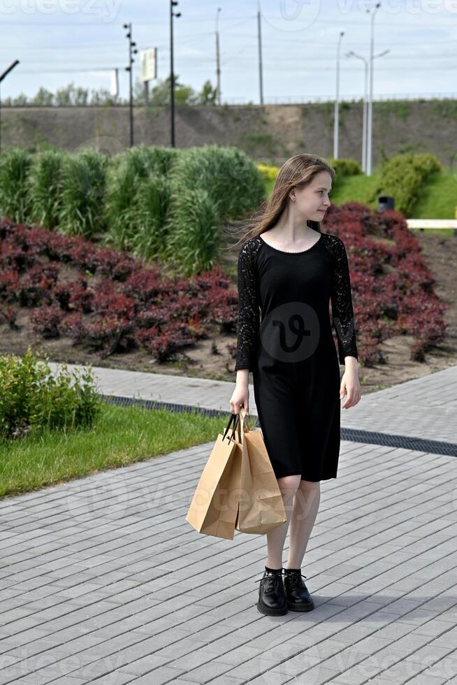 The background features a sleek, contemporary wall with geometric patterns, emphasizing an urban environment. photo