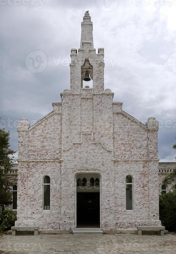 Ermita da Toxa, the chapel in Galicia covered by thousands of scallop shell photo