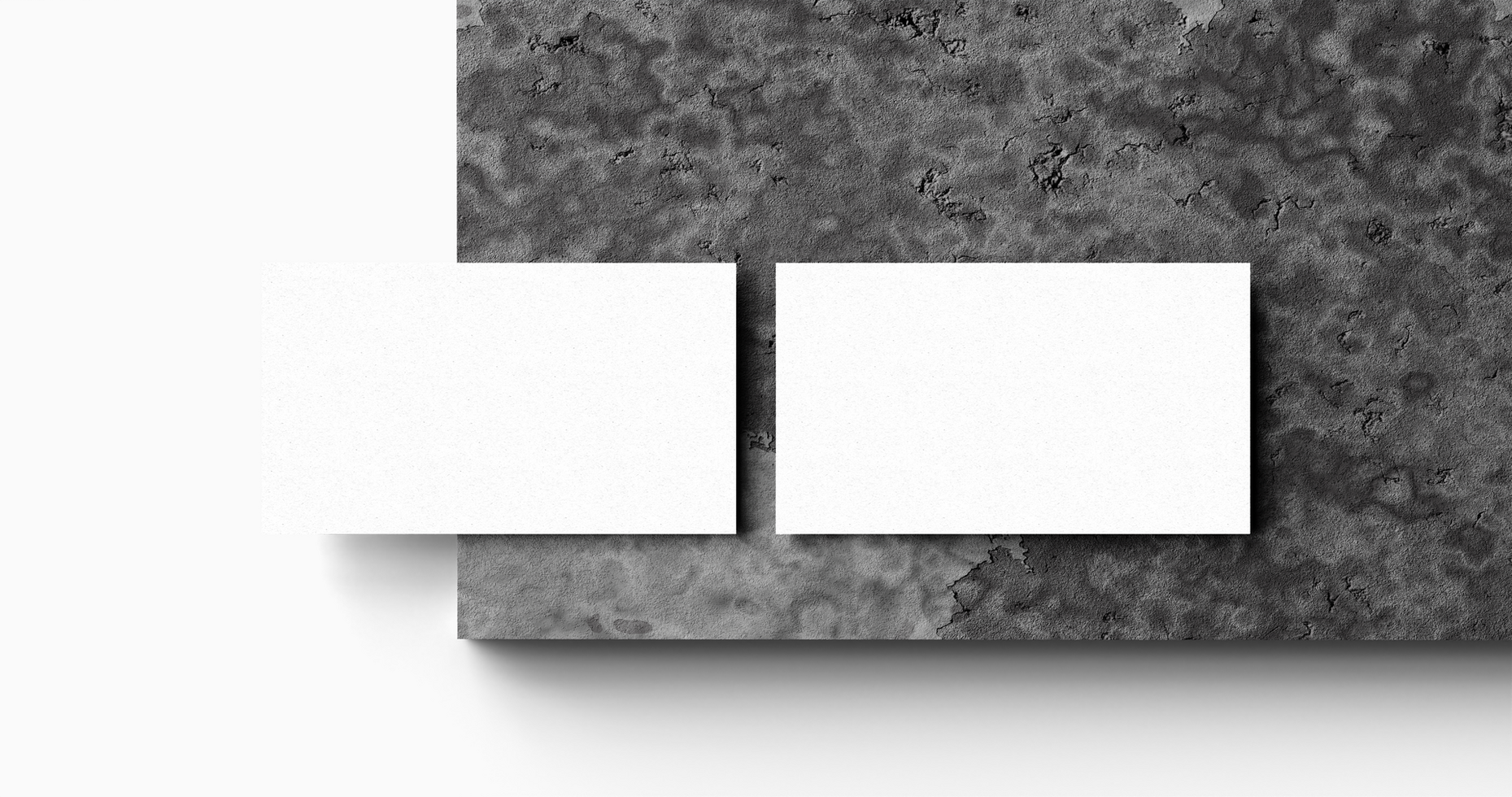 Business Card Mockup on Concrete Textured Background psd