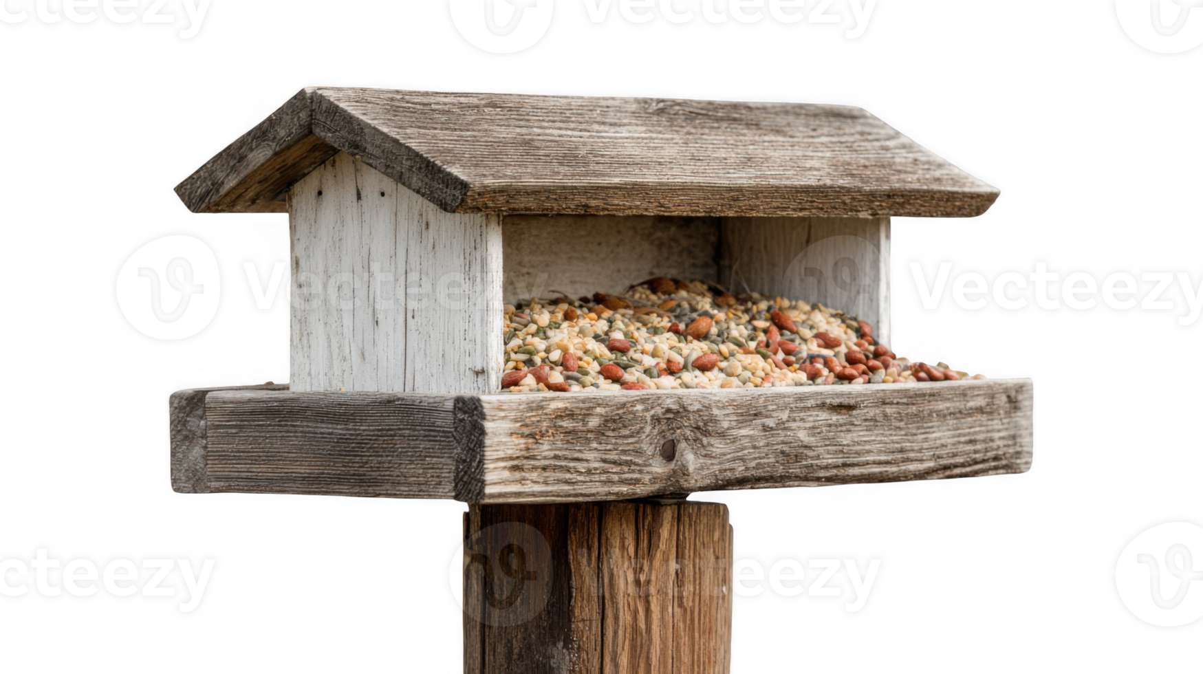 Homemade wooden bird feeder resting on garden post with birdseed png