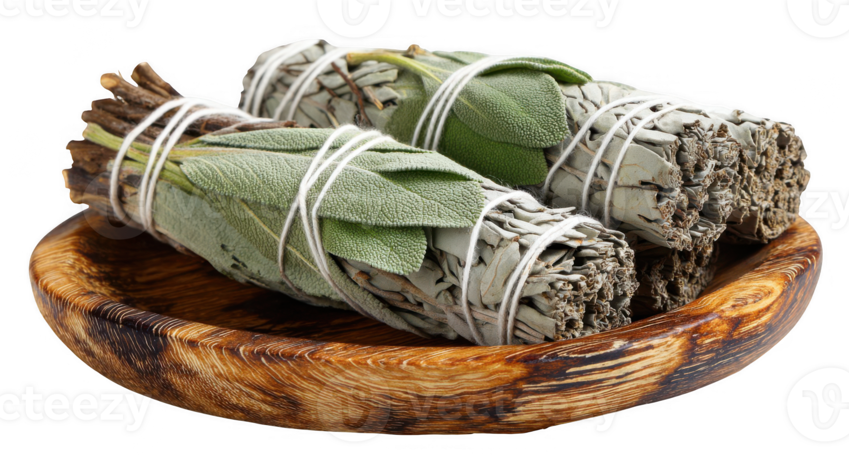 Sage bundles resting on wooden dish with transparent background png