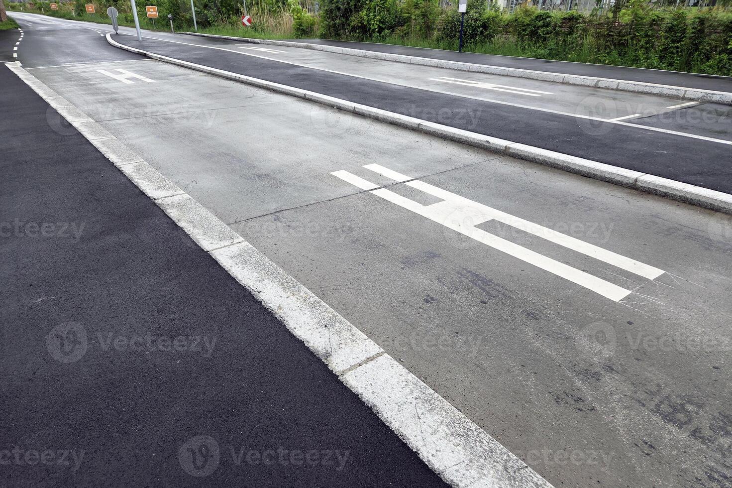 Urban Road Infrastructure with Bus Lane and Pedestrian Symbols for Traffic Management photo