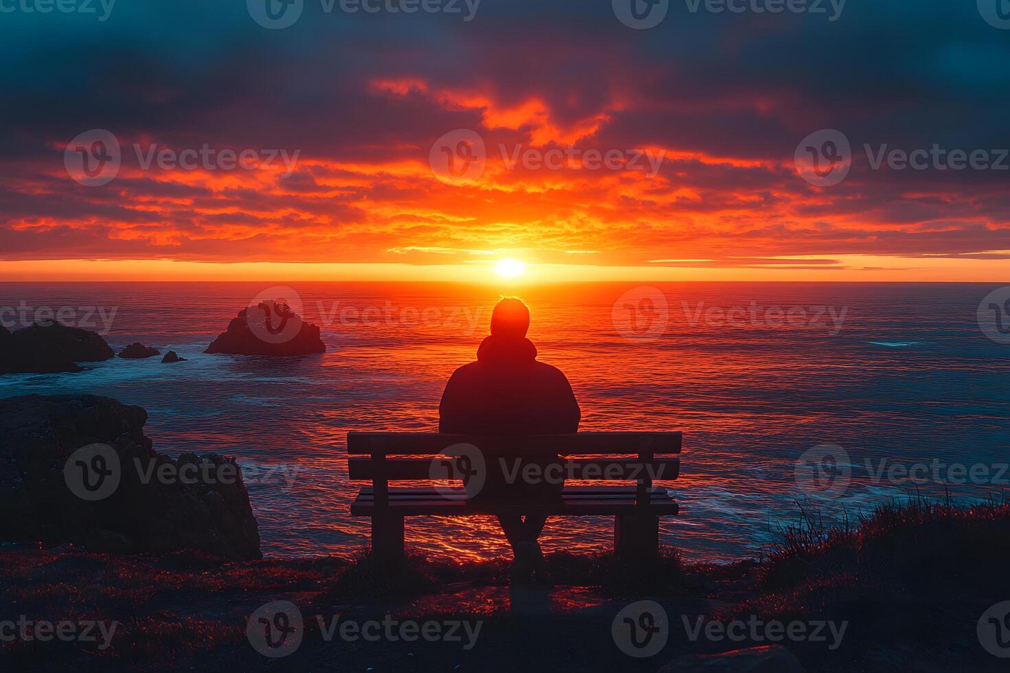 Silhouette at Sunset Serene Ocean View with Vibrant Horizon Colors photo