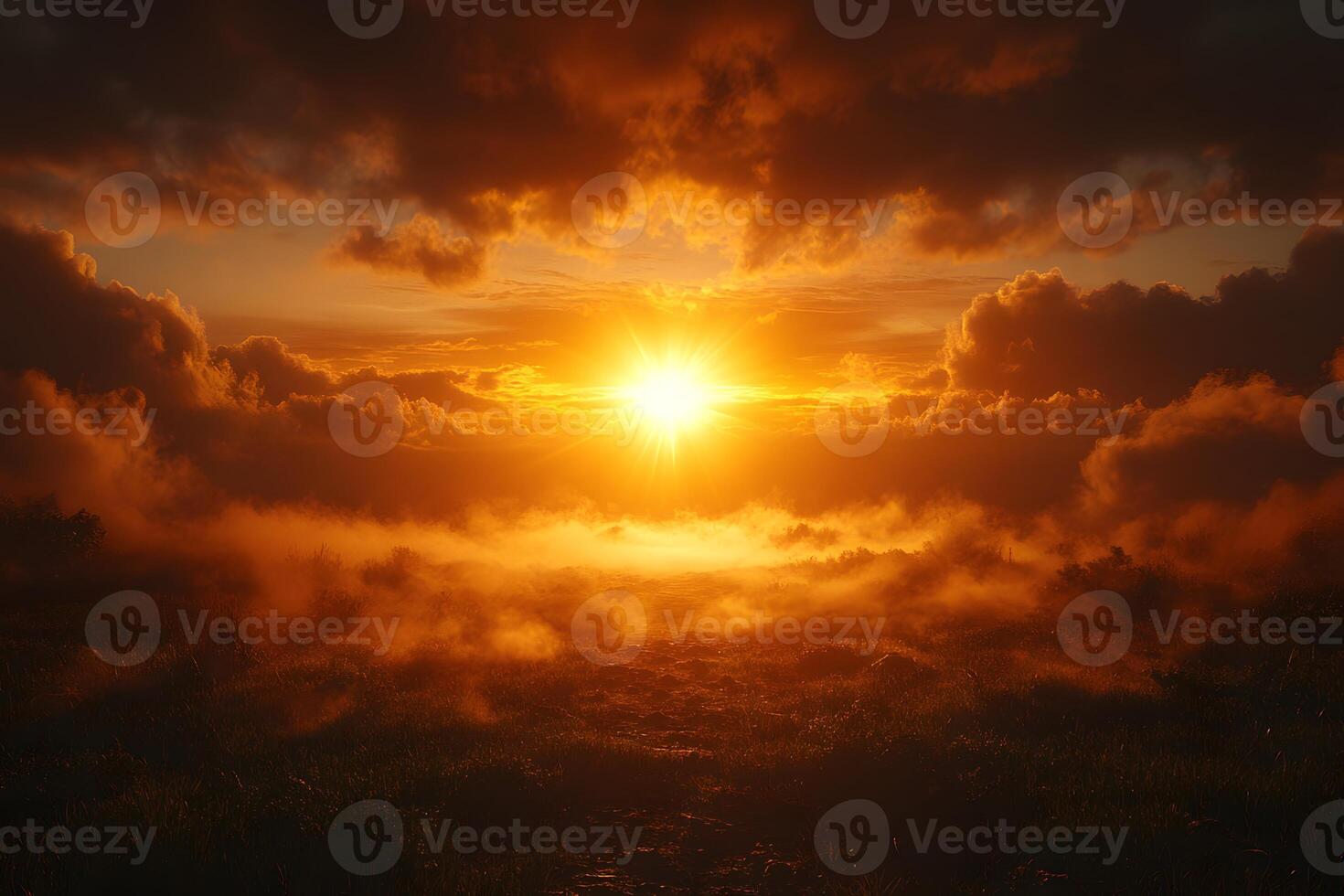 Majestic Sunset Over Misty Landscape with Dramatic Clouds and Warm Light photo