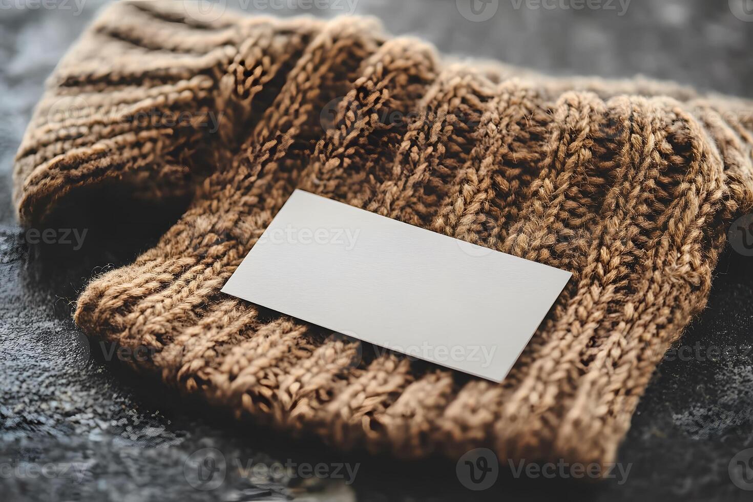 Rustic Autumn Fashion Concept with Knitted Sweater and Blank Card for Branding or Message photo
