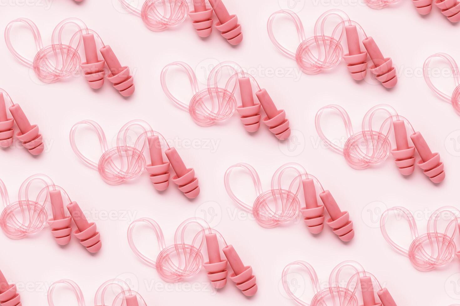 Creative pattern made powder pink silicone earplugs for swim, sleep, rest on pink background. Comfort ear plug on string against noise, protect hear, top view flat lay, visual trend concept photo