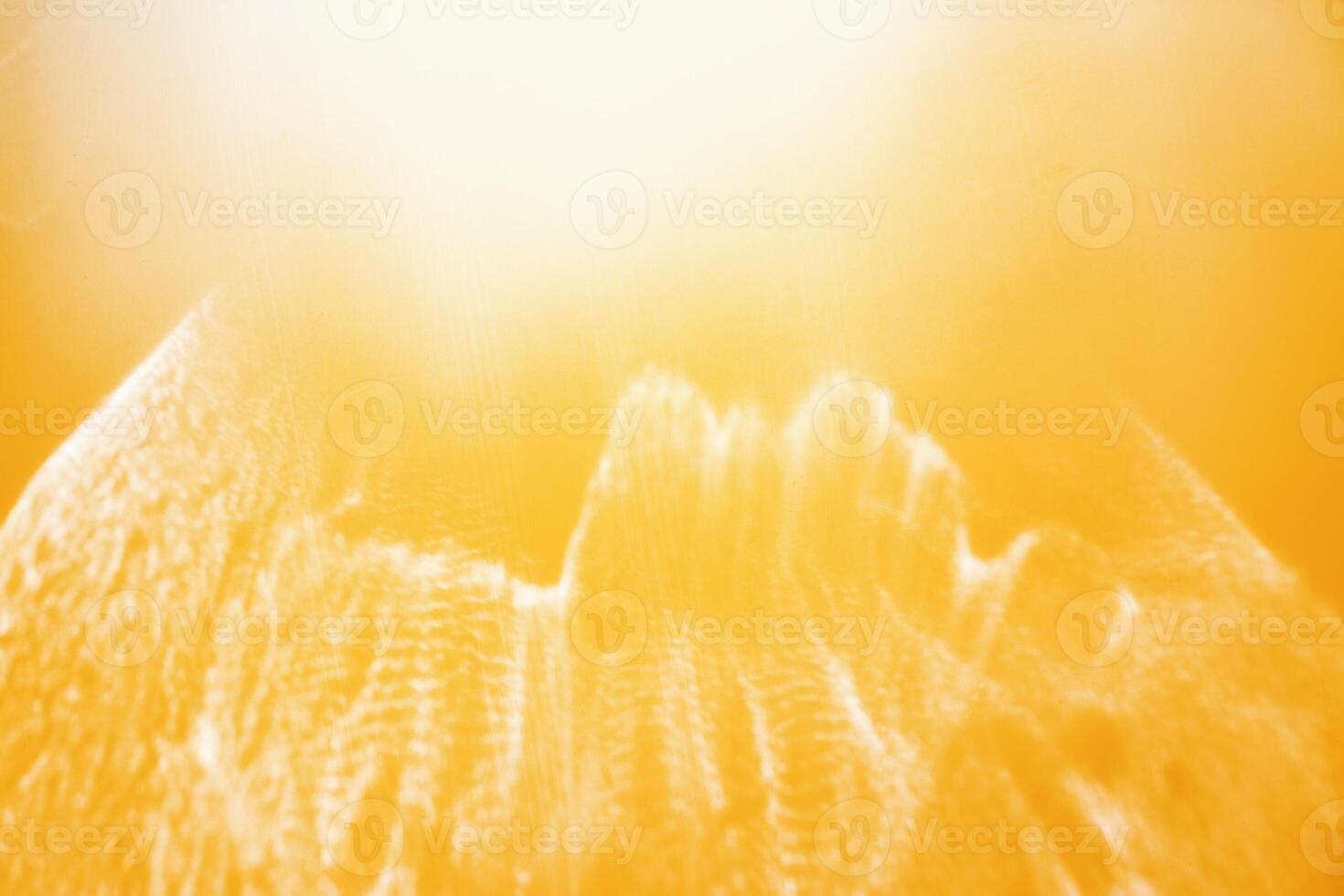 White shiny glare from sunlight on yellow background, abstract nature photo with sunshine flare, vivid color minimal aesthetic light effect, optical blur glow, defocused natural backdrop