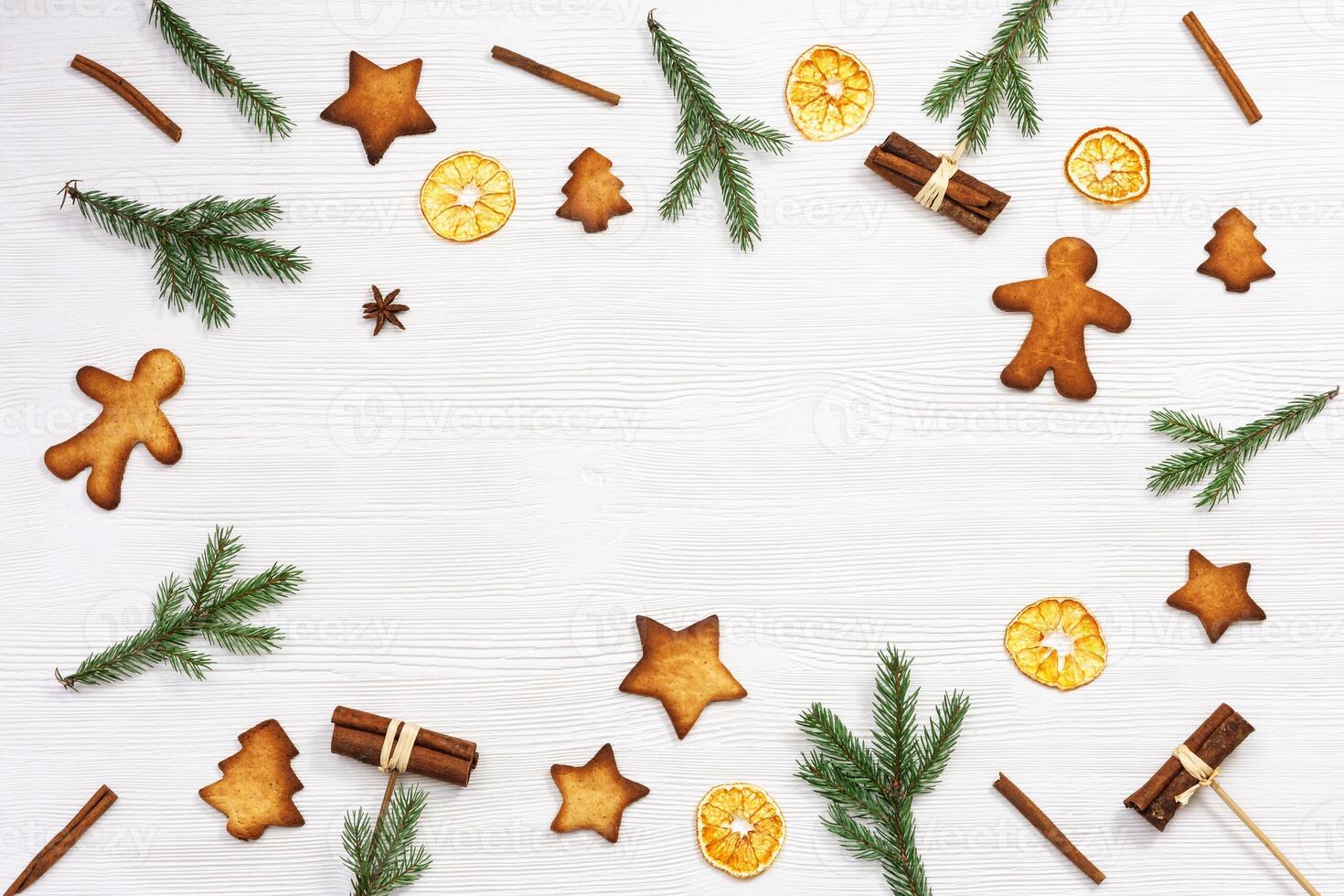 Baked Christmas ginger biscuits, traditional shapes, xmas sweet food background. Handmade cookies photo
