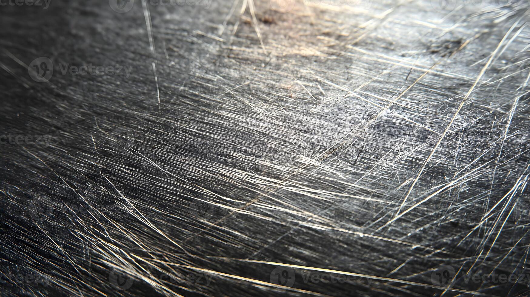 Distressed metallic surface with random scratches offering a gritty texture and industrial appeal photo