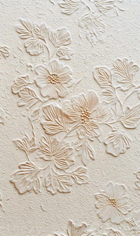 Elegant floral wallpaper featuring delicate embossed flowers adding texture and depth to a creamy surface beauty blooms photo